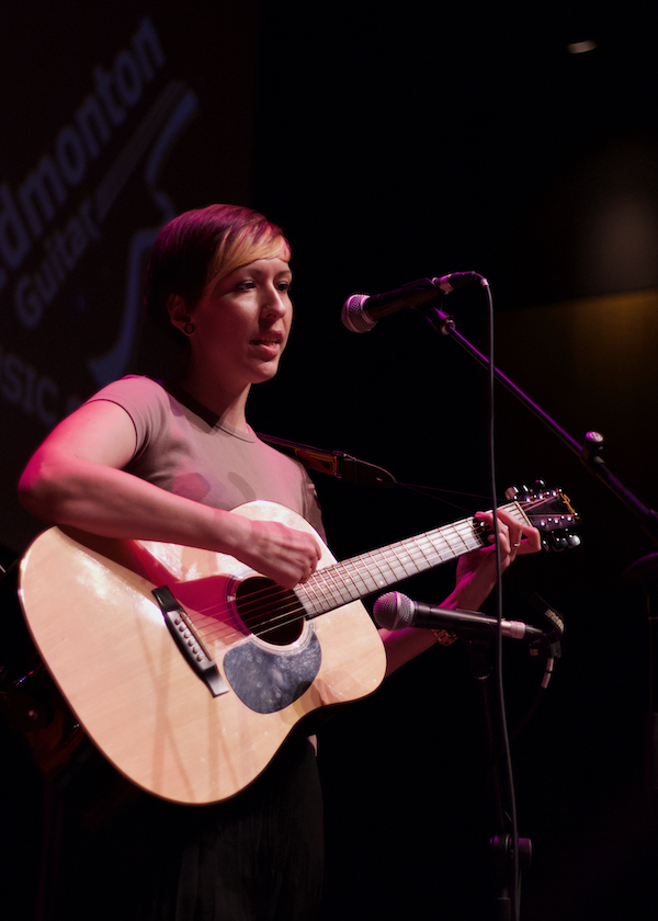 girl guitar students performance